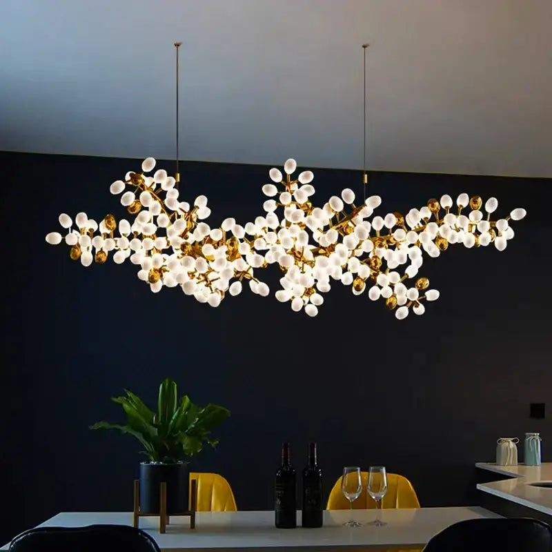 Gold-toned decorbites led chandelier with clusters of frosted glass globes for living room and bedroom lighting decor