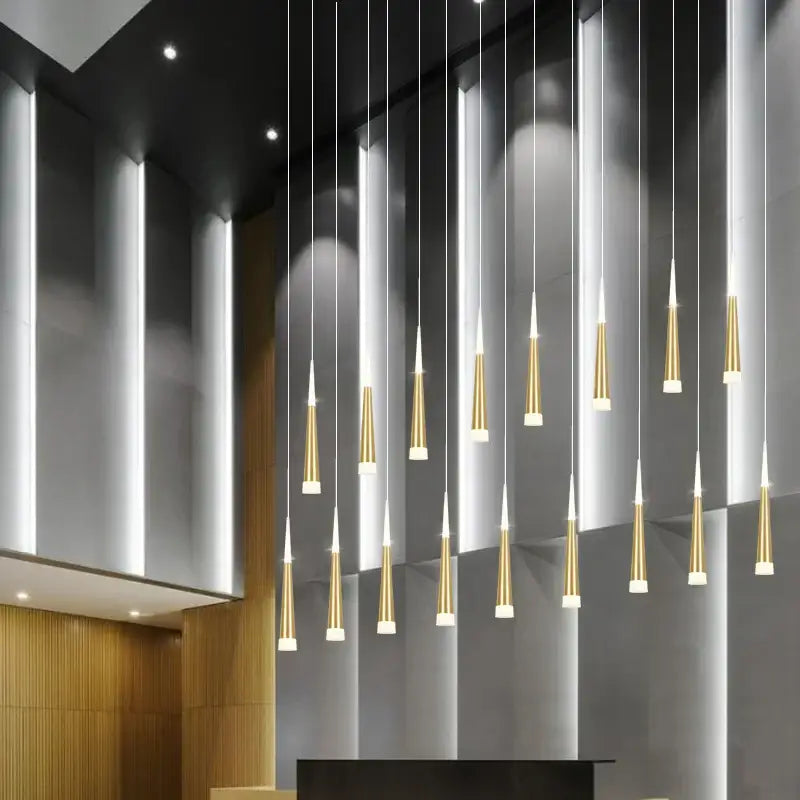 Modern gold and white decorbites led chandelier lighting with sleek tapered pendant design for staircase in villas and attics