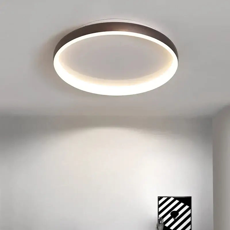 Modern circular led chandelier lights by decorbites with sleek dark bronze frame and soft white glow for home lighting