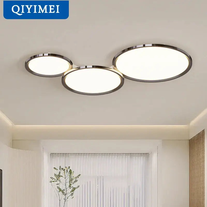 Modern gold-framed decorbites led chandelier with three overlapping illuminated panels for indoor living spaces