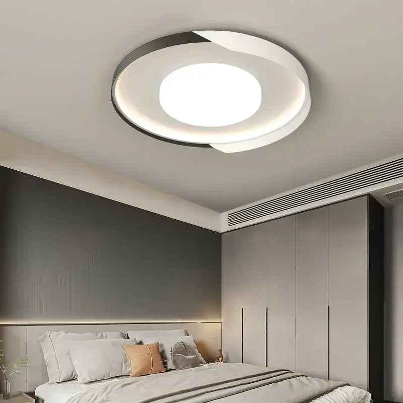Modern circular decorbites led chandelier with sleek white and black design featuring illuminated central circle ring