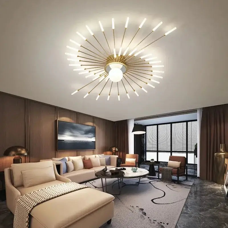 Gold-toned starburst DecorBites LED chandelier lights with slender rods and central bulb for modern indoor lighting