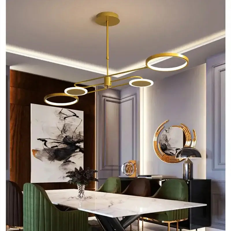 Decorbites led chandelier featuring a gold-toned modern design with circular ring led chandelier lights for home decor