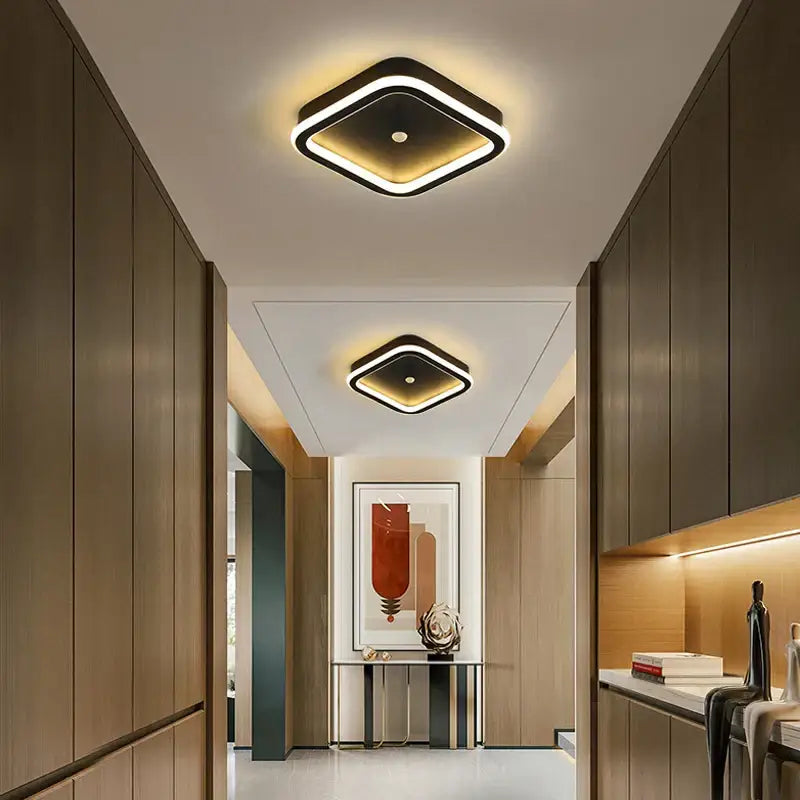 Modern square decorbites led chandelier with sleek black frame and glowing white led ring for indoor lighting