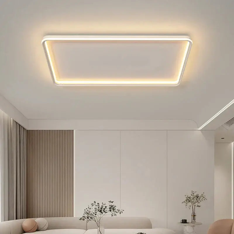 Modern rectangular DecorBites LED chandelier with sleek white frame and warm LED glow for indoor living spaces