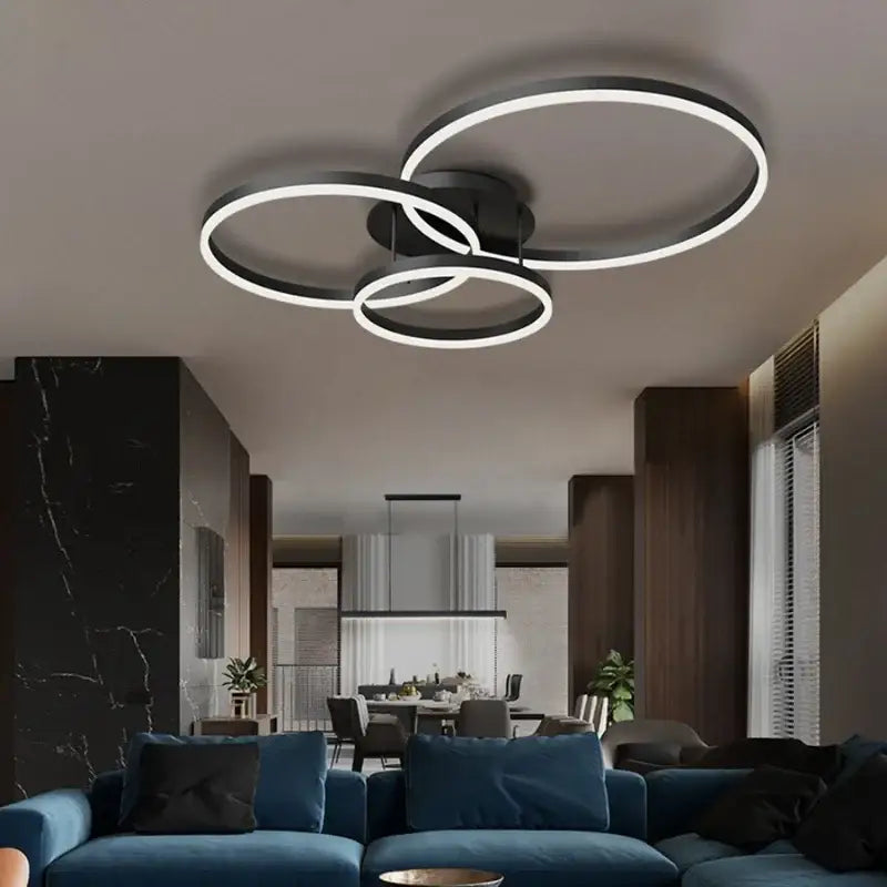 Modern black and white circular led chandelier with three interlocking rings by decorbites led for bedroom and dining room