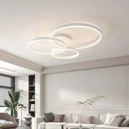Modern white circular decorbites led chandelier with three interlocking rings for bedroom and dining room lighting