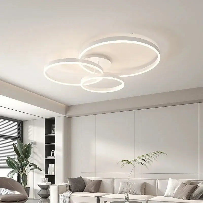 Modern white circular decorbites led chandelier with three interlocking rings for bedroom and dining room lighting
