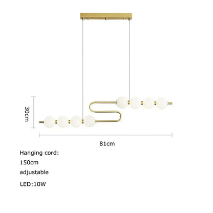 Gold-toned decorbites led chandelier with sleek curved metal frame and five frosted glass globes for dining room lighting