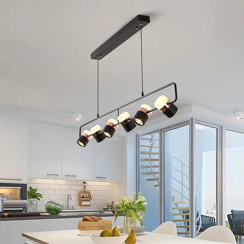 Modern black and copper DecorBites LED chandelier pendant lamp with five adjustable spotlight bulbs for dining room use