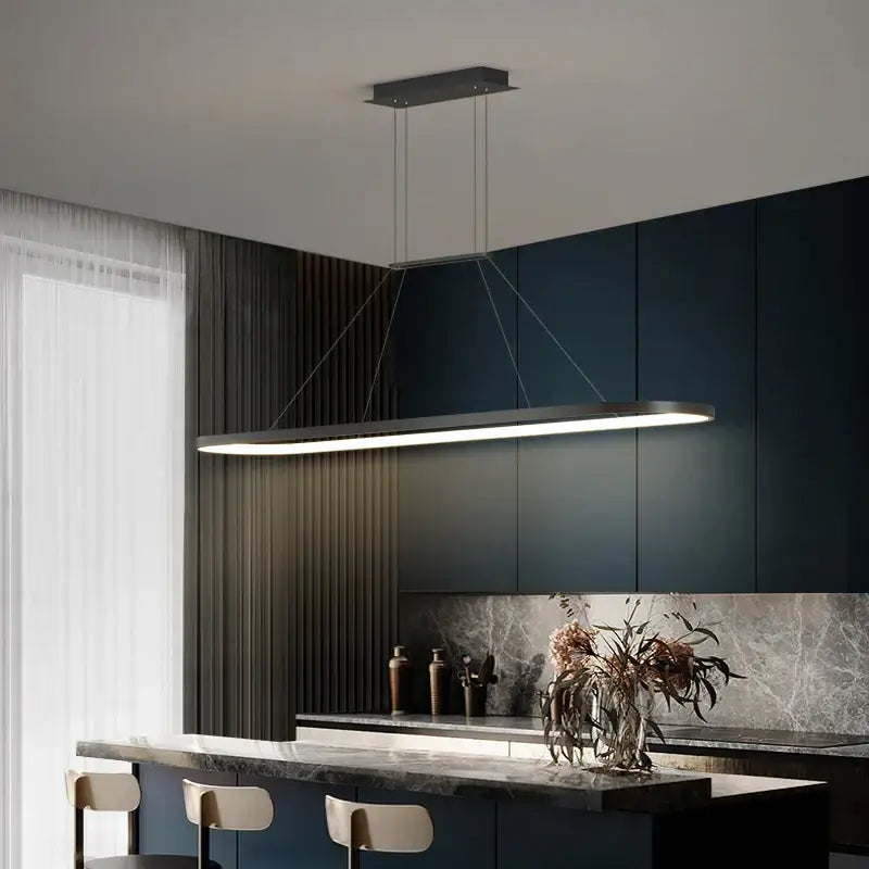 Modern rectangular pendant light with sleek metallic finish by decorbites led chandelier pendant above dark kitchen island