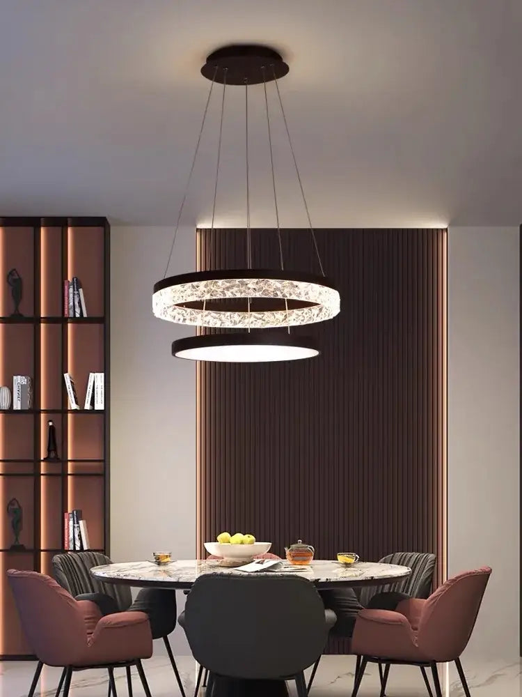Modern decorbites led chandelier pendant light with a black frame and sparkling crystal accents for home decor