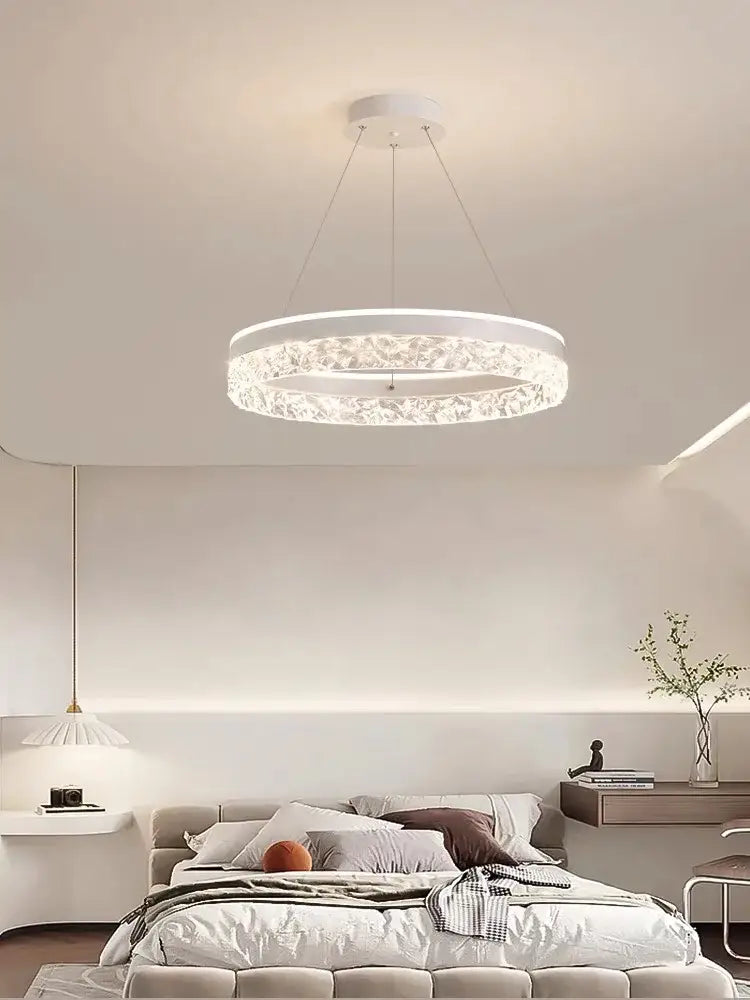 Modern white pendant light featuring a crystal-encrusted ring and sleek metal suspension decorbites led chandelier pendant