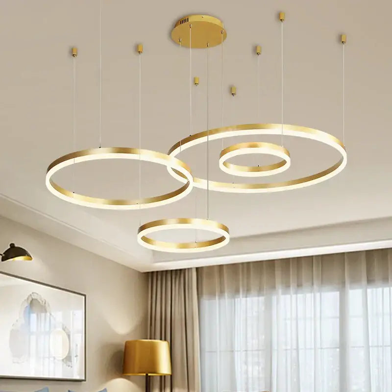 Modern gold-finished circular pendant light with sleek minimalist design decorbites led chandelier rings dimmable ceiling lamp