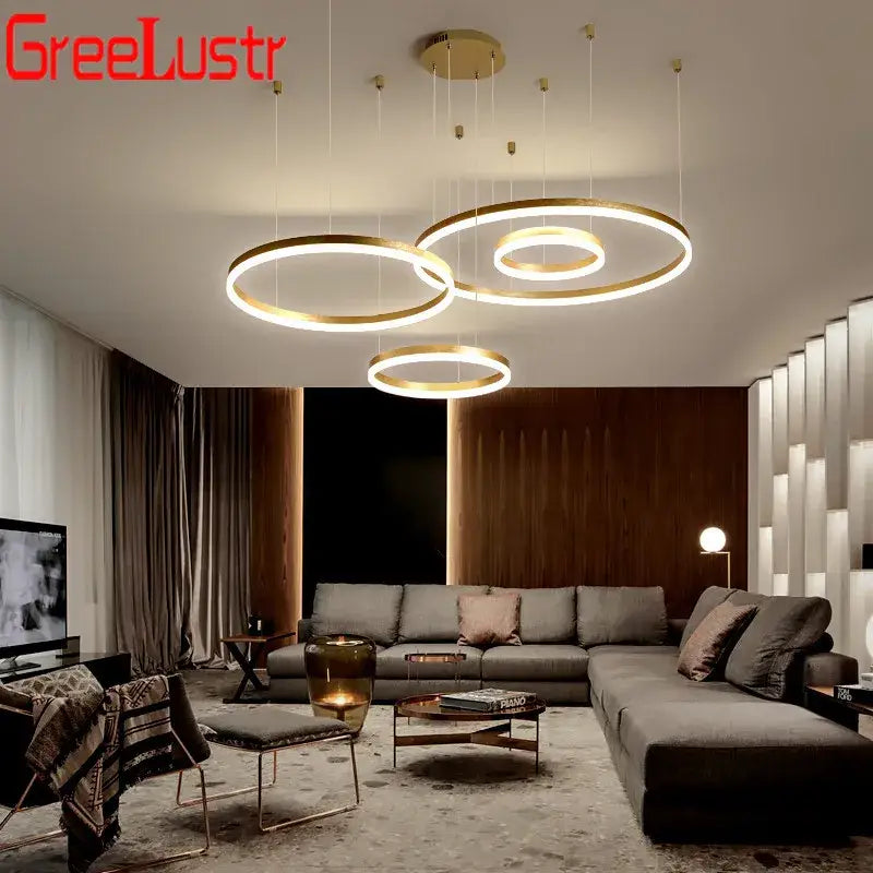 Modern gold-toned dimmable decorbites led chandelier rings pendant light with sleek minimalist design for ceiling lighting