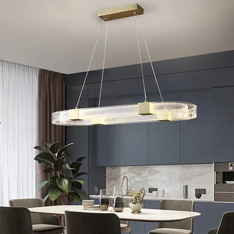 Modern oval decorbites led chandelier with gold metal frame and clear crystal accents for living room lighting