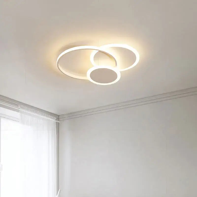 Modern white circular led chandelier with overlapping rings from decorbites led chandelier for living room and bedroom