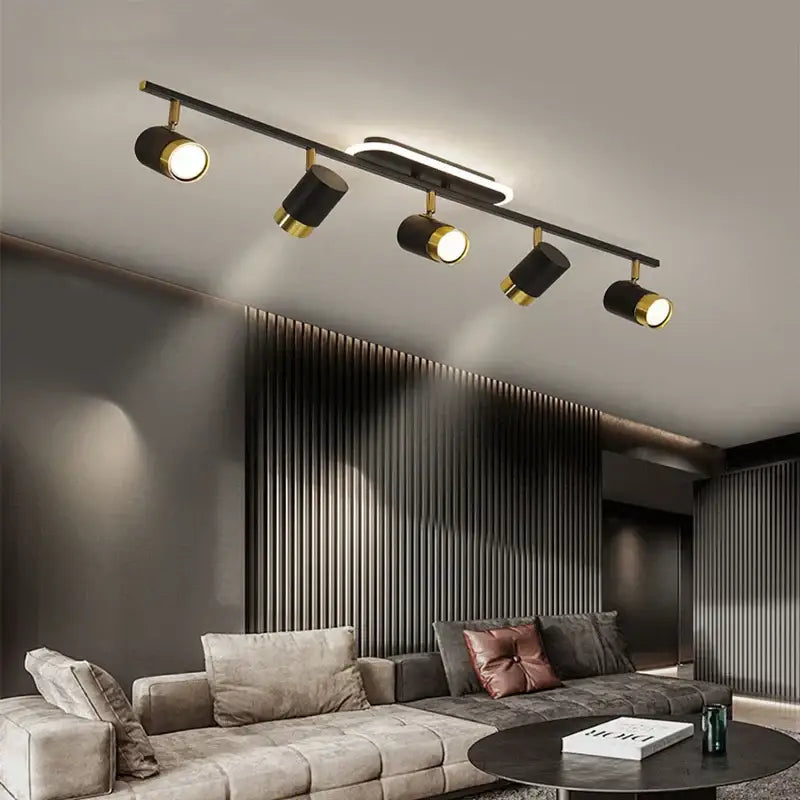 Black and gold DecorBites LED chandelier with four adjustable spotlights for living space ceiling decor
