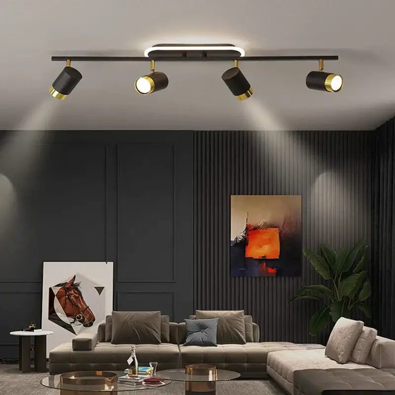 Black and gold track lighting fixture with four adjustable spotlights from decorbites led chandelier collection for ceiling decor