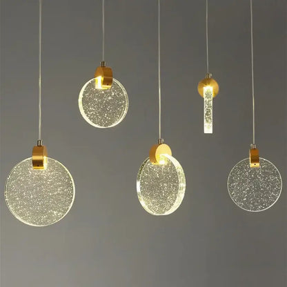 Modern circular led crystal pendant light with gold-toned fixtures and sparkling glass shades for bedroom and bathroom