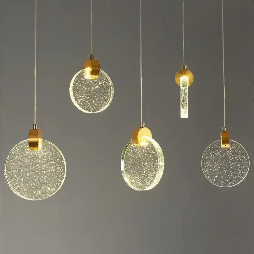 Modern circular led crystal pendant light with gold-toned fixtures and sparkling glass shades for bedroom and bathroom