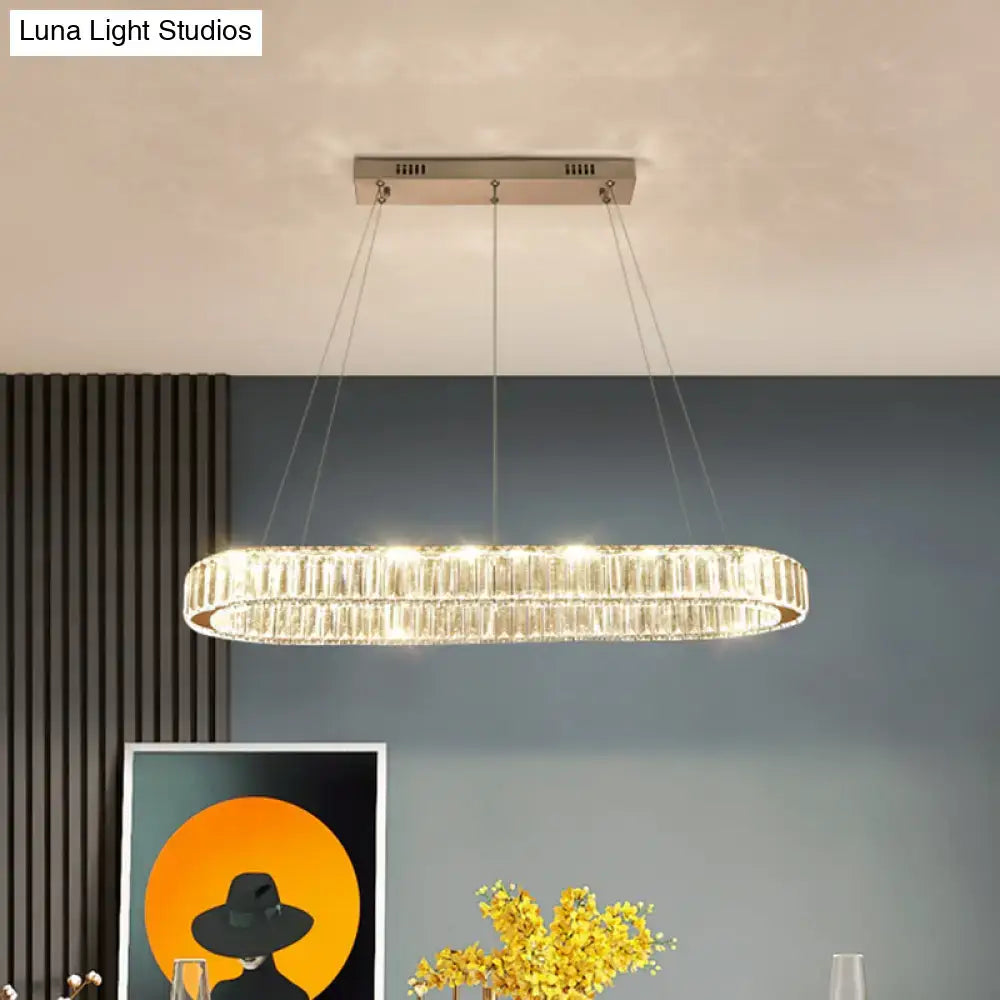 Modern oval decorBites™ ceiling light with sleek stainless steel frame and cascading clear crystal accents for restaurants