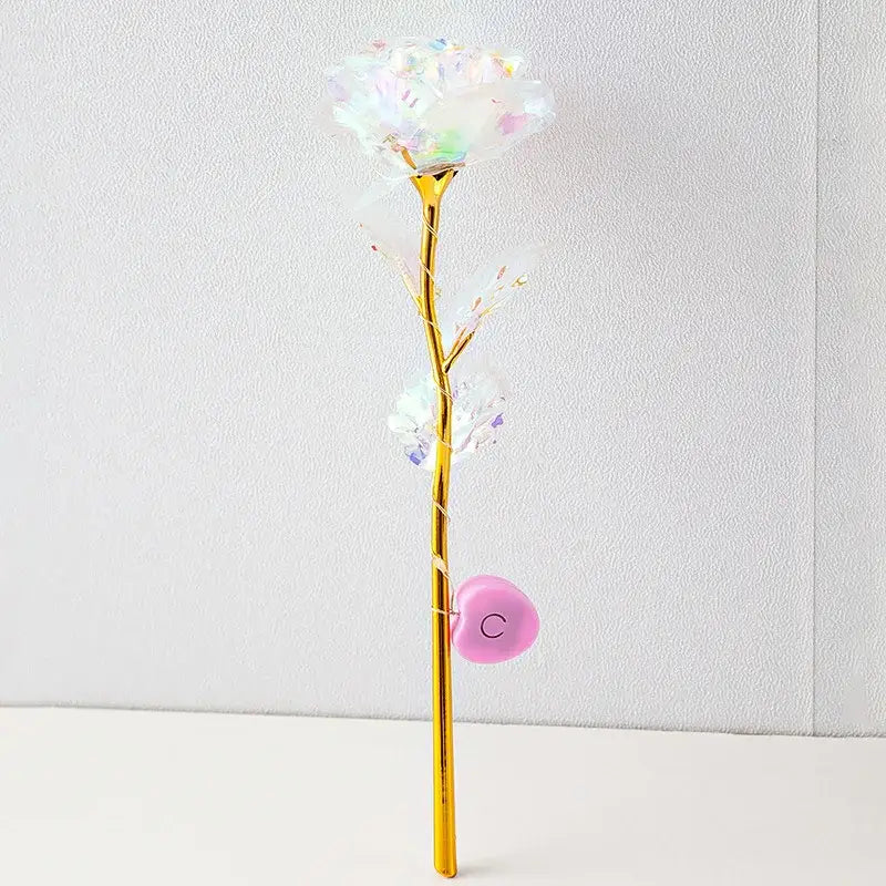 Decorbites™ eternal rose light with gold stem, iridescent petals, crystals, and pink heart charm for weddings and valentine’s day