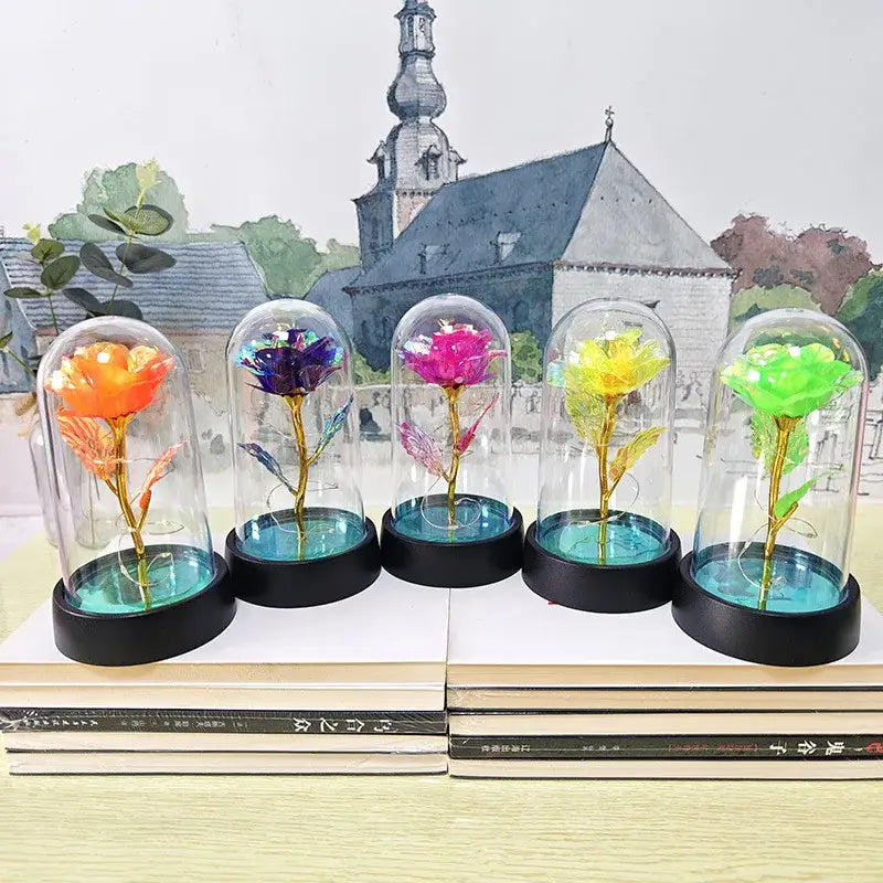 DecorBites™ five colorful metallic eternal rose lights encased in glass domes with blue liquid bases for weddings