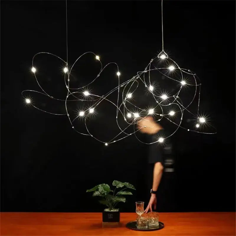 DecorBites™ led firefly chandelier with bright white leds and thin metallic wires showcasing engineering minimal design