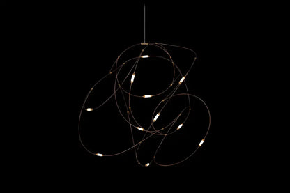 DecorBites™ LED firefly chandelier with engineering minimal design featuring metallic wire abstract circles and warm LED lights