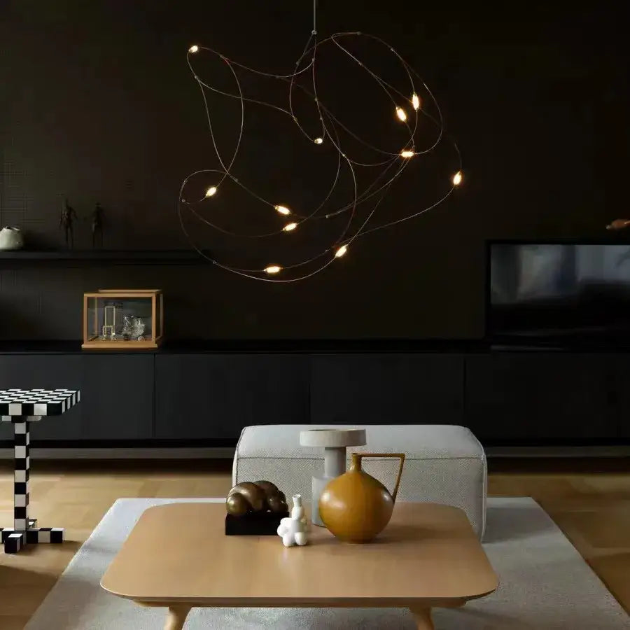 DecorBites™ LED firefly chandelier with thin metallic wires and warm bulbs in engineering minimal design for hotels and kitchens