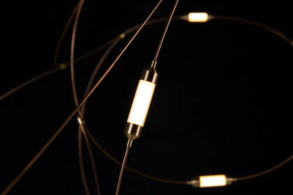 Decorbites™ led firefly chandelier with sleek cylindrical design, warm white glow, metallic ends for hotel and kitchen use