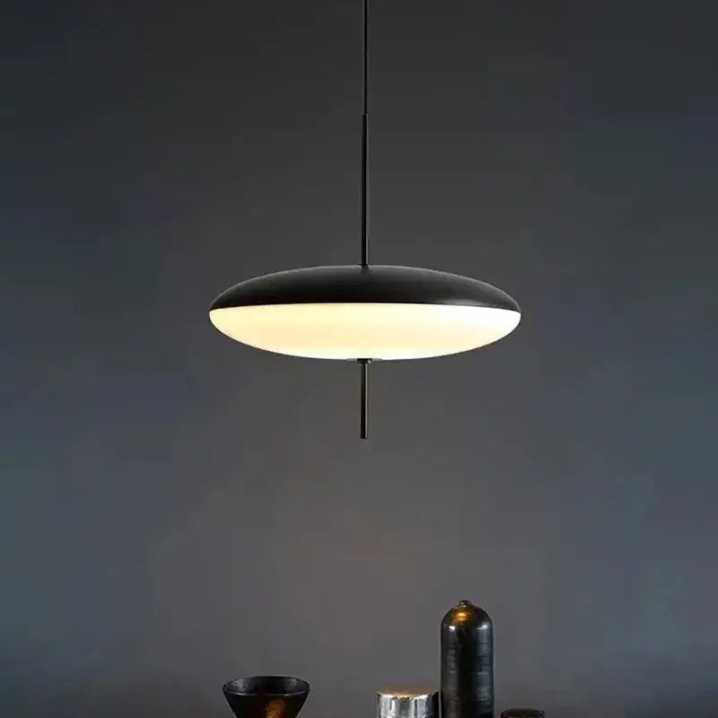 Modern black decorbites led flying saucer pendant lights with sleek disc design and warm diffused glow for dining room