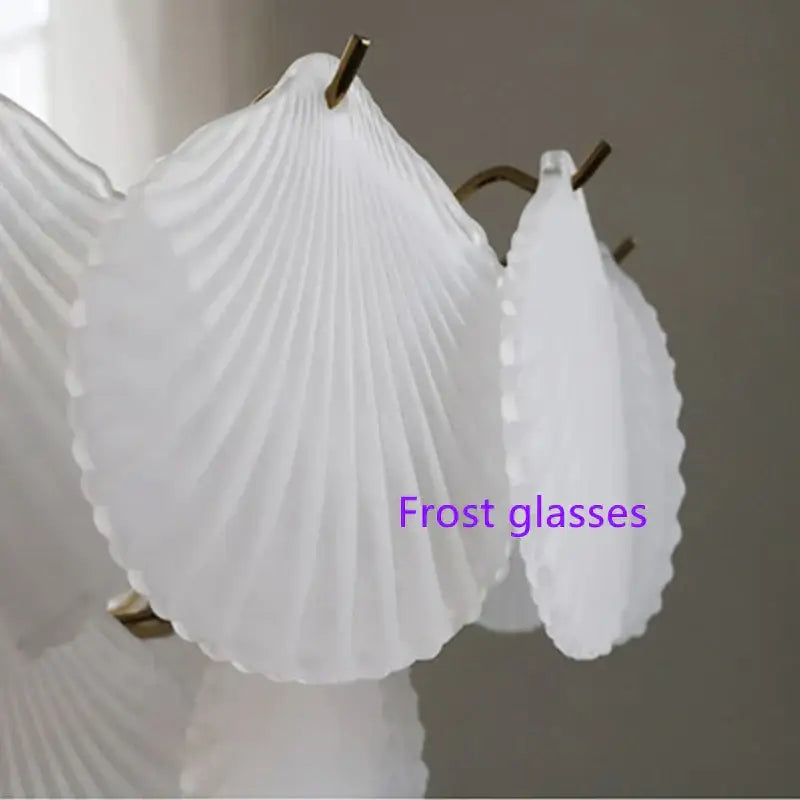 Decorbites led frost glass shell chandelier with white frosted glass seashell sconces and gold-toned metal fixtures