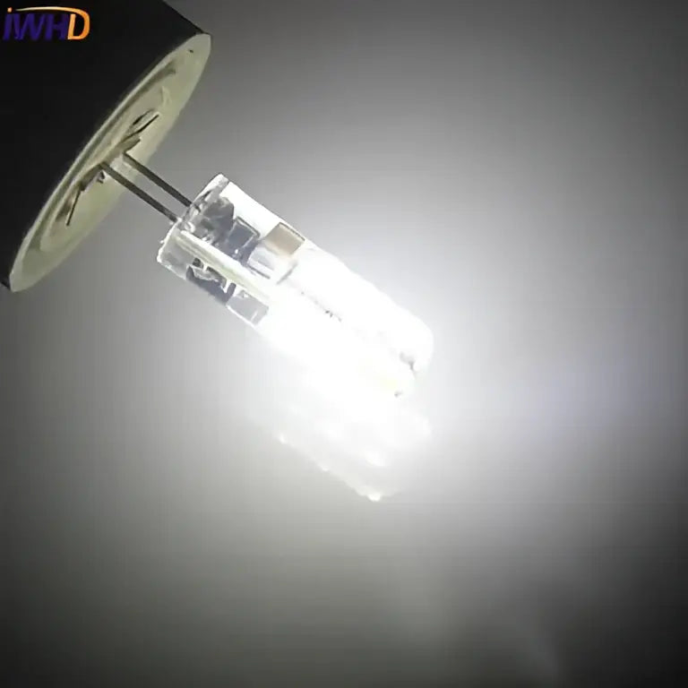 White led g4 bulb with clear glass casing and metallic base from DecorBites led for chandelier and halogen replacement