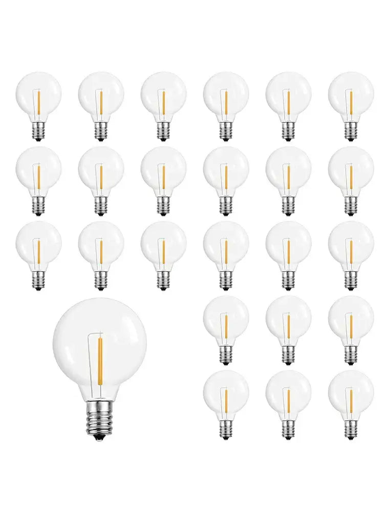 Clear glass globe-shaped decorbites led g40 e12 bulbs with visible filament arranged in a grid for outdoor garden decor