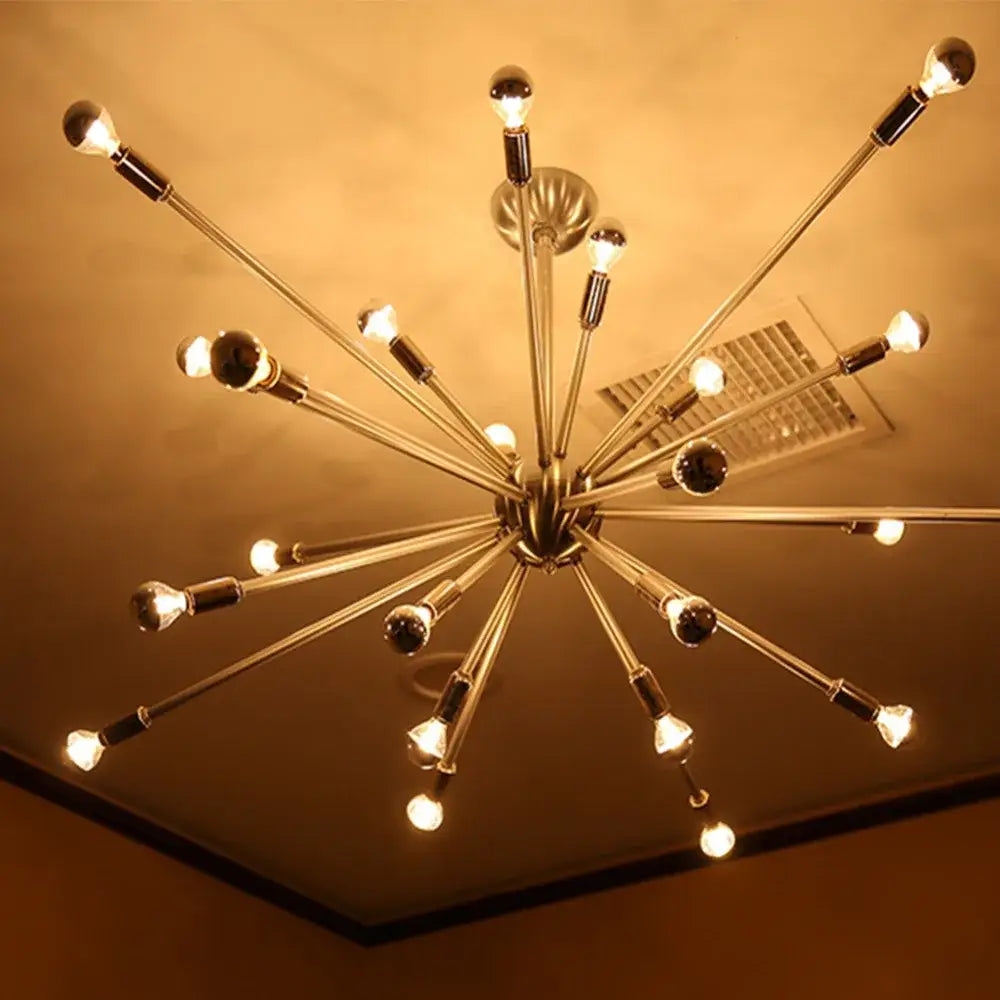 A sleek brushed brass starburst chandelier with polished metallic arms showcasing decorbites led g45 globe bulbs
