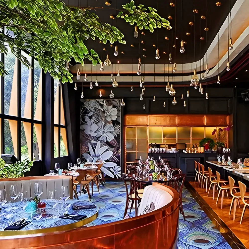 The restaurant ceiling with hanging decorbites led g45 globe dimmable silver bowl bulbs and lush greenery accents