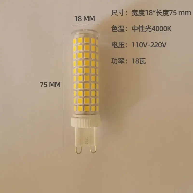A 75mm tall decorbites led g9 bulb with clear glass housing yellow leds and warm natural white light base with two prongs