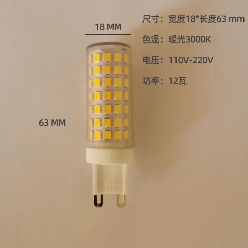 A warm natural white DecorBites LED G9 bulb with clear glass body and integrated 12 watt g9 base
