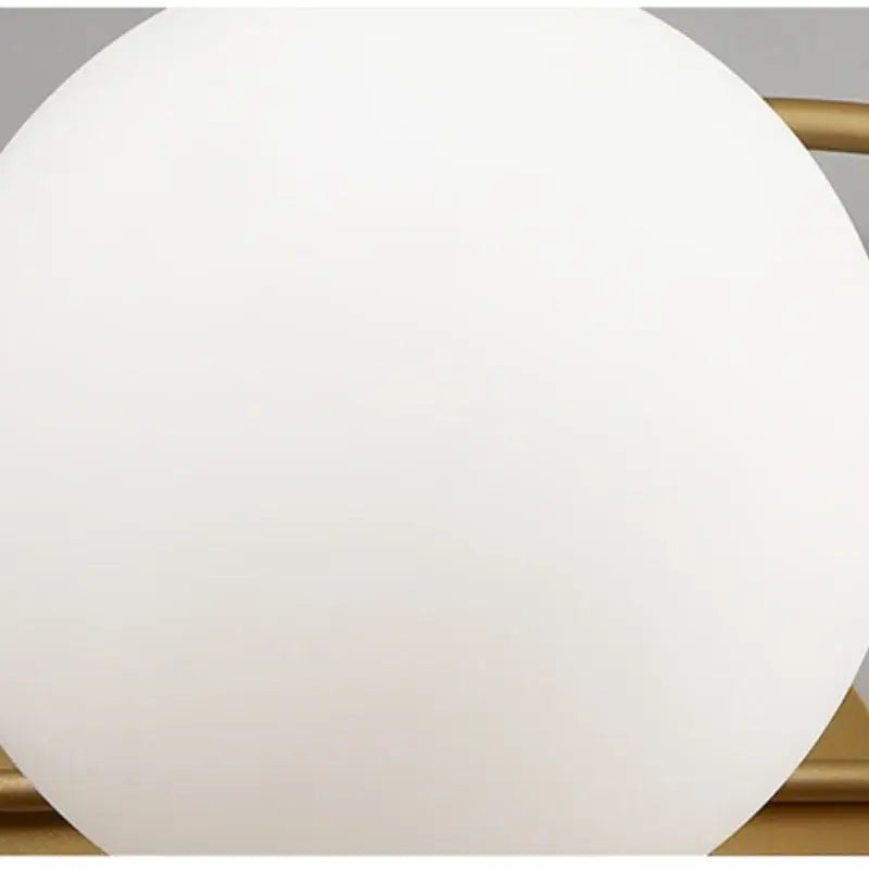 Decorbites led g9 wall sconce with a sleek frosted white spherical lampshade and polished gold metal frame for modern decor