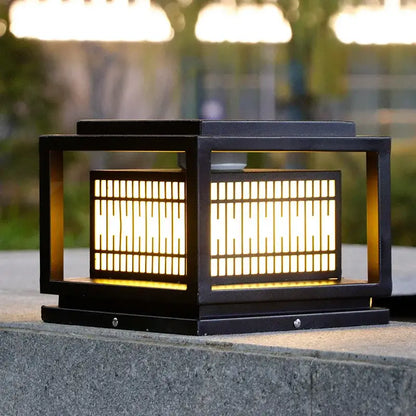 Black rectangular DecorBites LED garden light with warm glow and vertical slats for outdoor landscapes