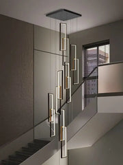 Modern geometric chandelier with sleek black and gold rectangular fixtures by DecorBites LED geometry stair chandelier