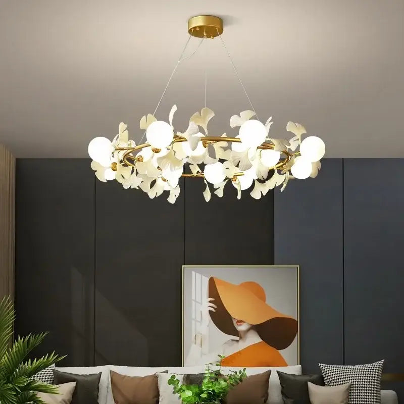 Modern decorbites led gingko ceiling chandelier with gold circular frame and white petal-shaped glass shades in floral design