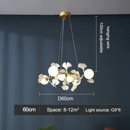 Gold-toned DecorBites LED Gingko ceiling chandelier with white leaf-shaped glass shades and spherical bulbs in a branching design