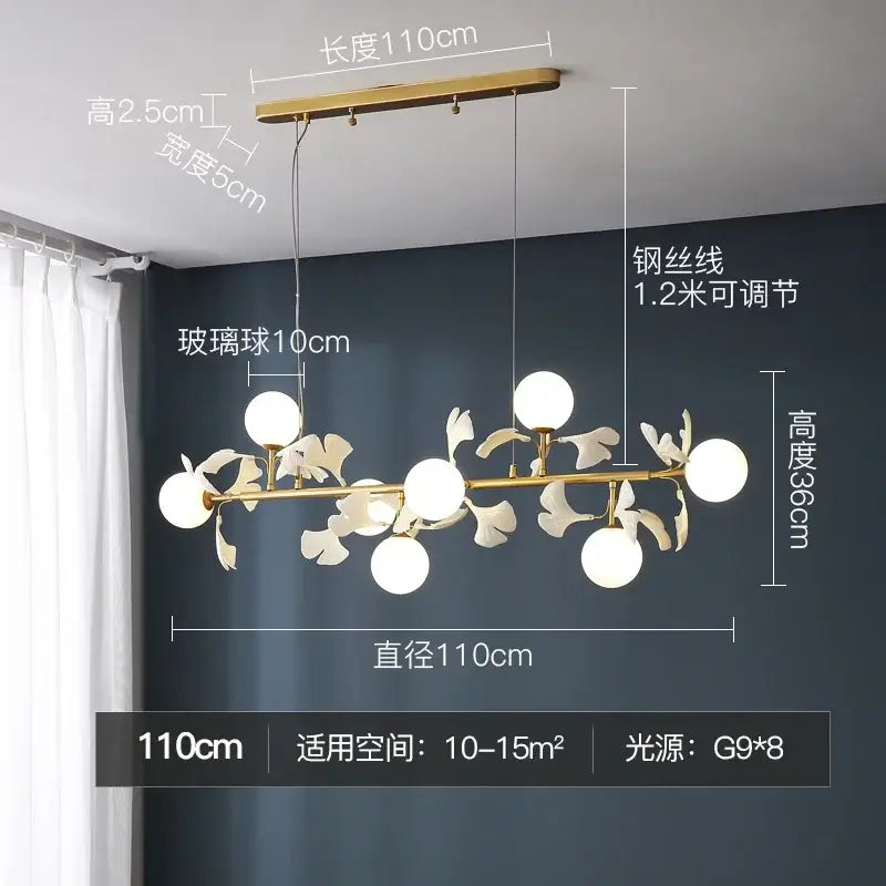 Gold-toned decorbites led gingko ceiling chandelier with six glass globes and leaf-shaped metal accents for modern rooms