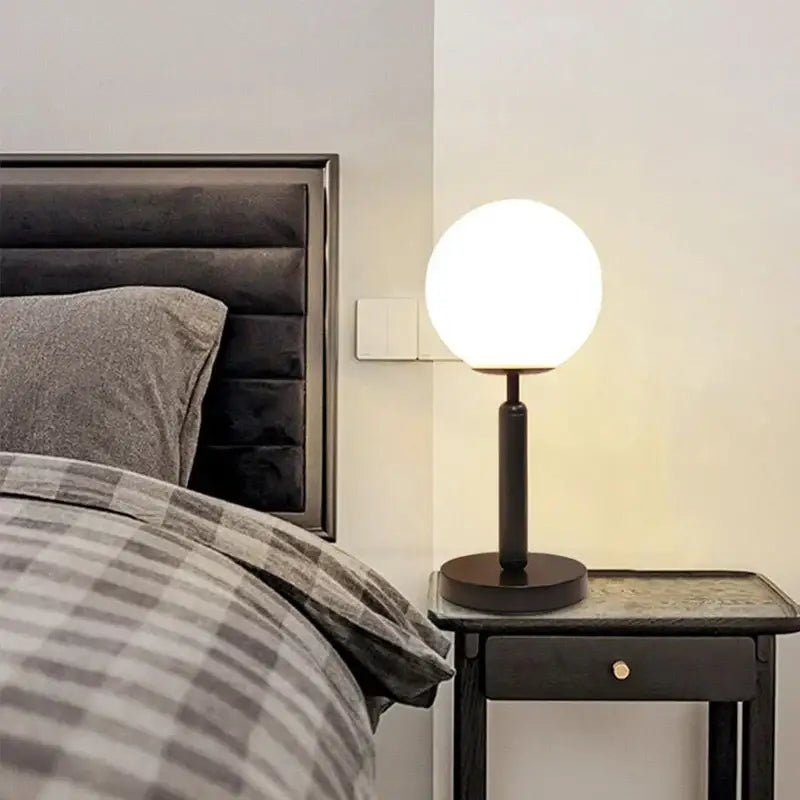 Modern black table lamp with a spherical frosted glass globe decorbites led glass ball for luxury home decor
