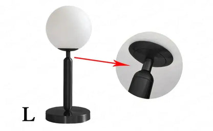 Black spherical decorbites led glass ball table lamp with matte finish and circular base for luxury home decor