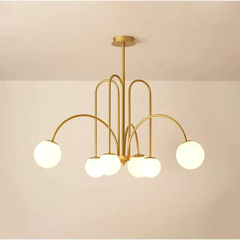 Gold-toned decorbites led glass ball ceiling chandelier with five curved arms and frosted glass shades for home decor lighting