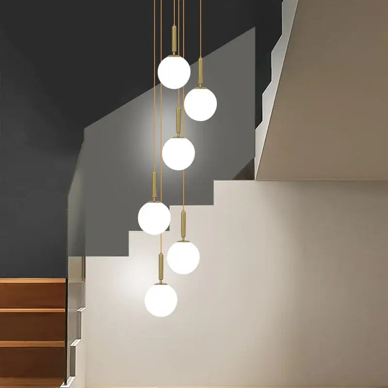 DecorBites™ LED glass ball chandelier with five frosted glass bulbs on brass rods for home dining and hotel decor